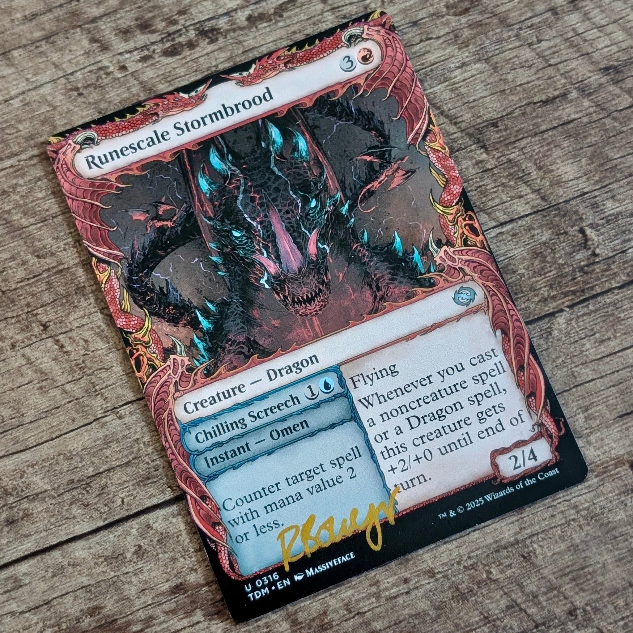 Trading card featuring a dragon on a wooden surface